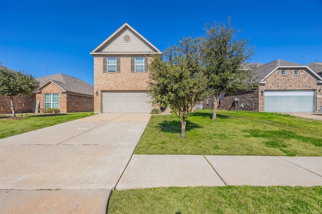 traditional-style house featuring a front yard, concrete driveway, brick siding, and an attached garage