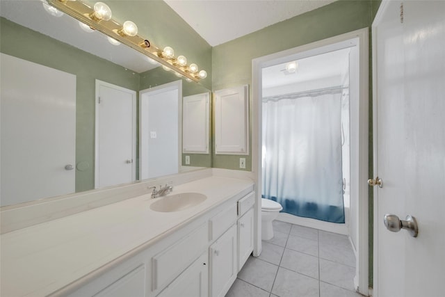 bathroom with toilet, tile patterned flooring, shower / bath combo, and vanity