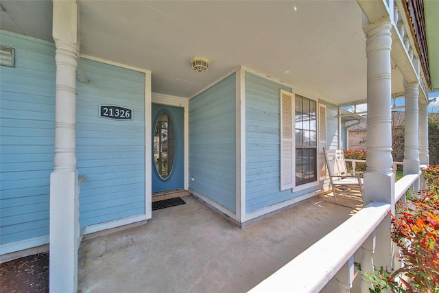 property entrance with a porch