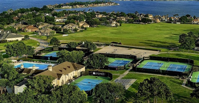 birds eye view of property featuring a water view and a residential view