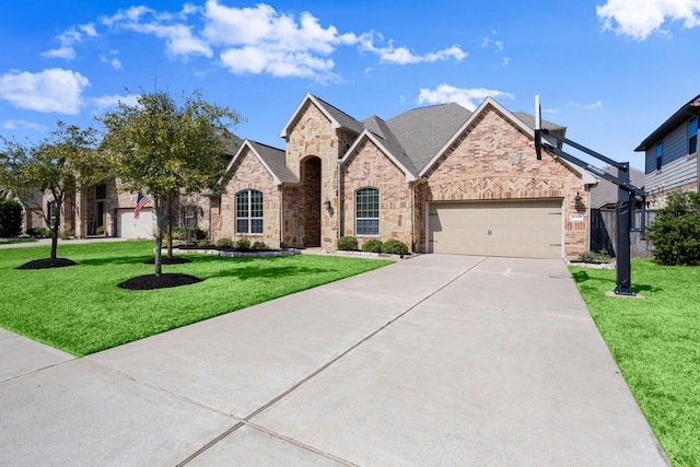 view of front facade featuring concrete driveway, a front lawn, an attached garage, and brick siding