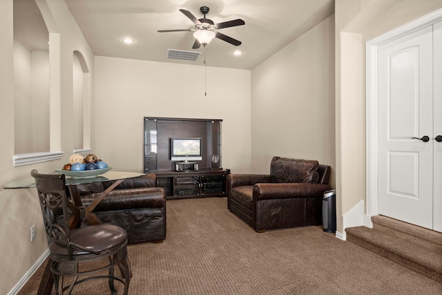 18419 Harlow Dr, Tomball, TX 77377 - living room with carpet floors, ceiling fan, arched walkways, and baseboards