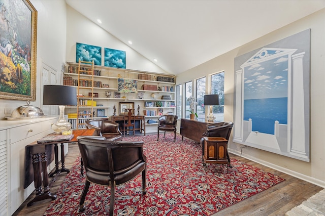 office area featuring high vaulted ceiling, recessed lighting, wood finished floors, and baseboards