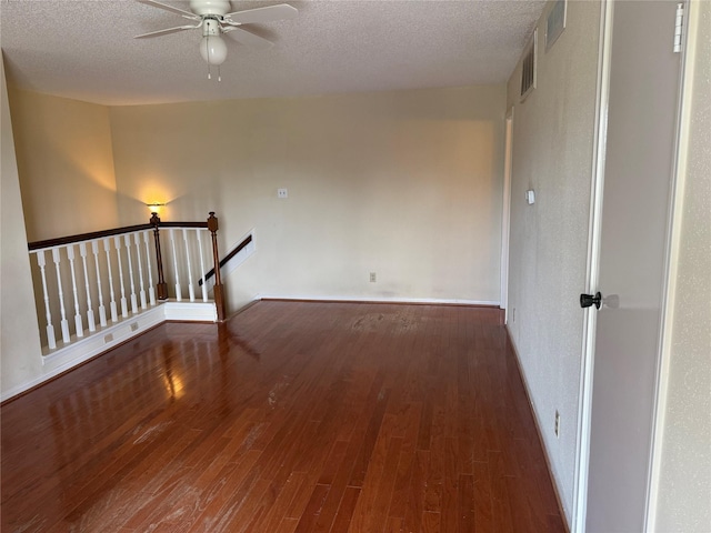 2120 El Paseo St Unit 3301, Houston, TX 77054 - spare room featuring a ceiling fan, wood finished floors, and a textured ceiling