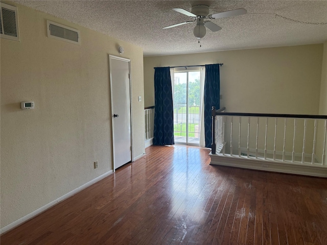 2120 El Paseo St Unit 3301, Houston, TX 77054 - unfurnished room featuring wood-type flooring, ceiling fan, a textured ceiling, and a textured wall