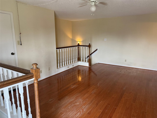 2120 El Paseo St Unit 3301, Houston, TX 77054 - unfurnished room with ceiling fan, wood finished floors, and a textured ceiling