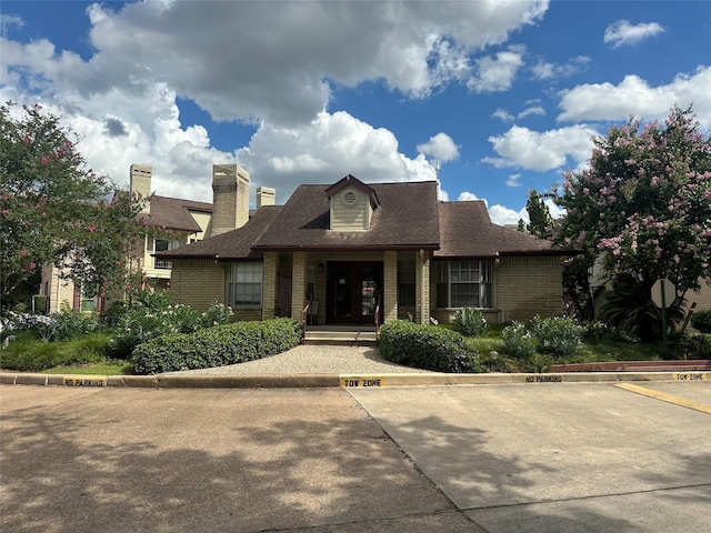2120 El Paseo St Unit 3301, Houston, TX 77054 - view of front of property with brick siding, uncovered parking, and roof with shingles