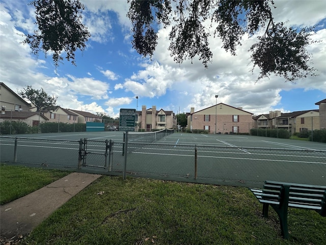 2120 El Paseo St Unit 3301, Houston, TX 77054 - view of tennis court with a residential view and a gate