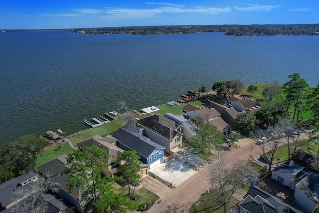 birds eye view of property with a residential view and a water view