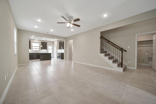 4215 Sternside Ln, Houston, TX 77053 - unfurnished living room with a ceiling fan, light tile patterned floors, baseboards, stairway, and recessed lighting