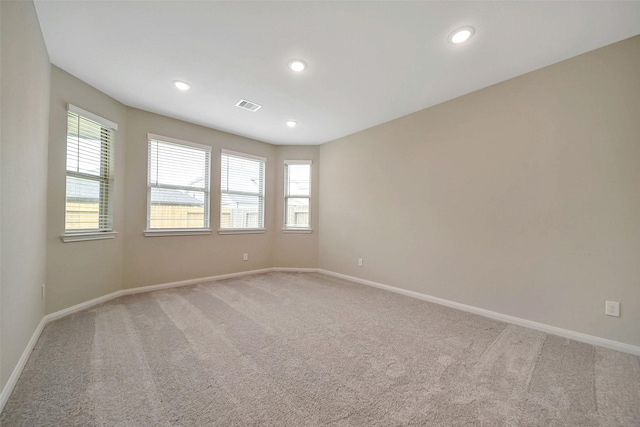 4215 Sternside Ln, Houston, TX 77053 - spare room with light colored carpet, baseboards, and recessed lighting