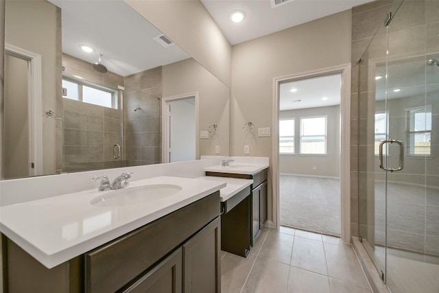 4215 Sternside Ln, Houston, TX 77053 - bathroom with tile patterned floors, vanity, a shower stall, baseboards, and recessed lighting