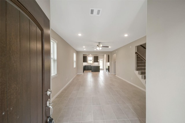 4215 Sternside Ln, Houston, TX 77053 - unfurnished living room with ceiling fan, stairway, light tile patterned flooring, baseboards, and recessed lighting