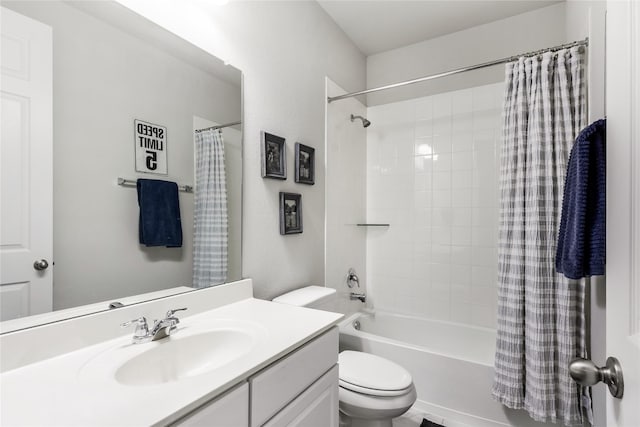 full bath featuring shower / bath combo, vanity, and toilet