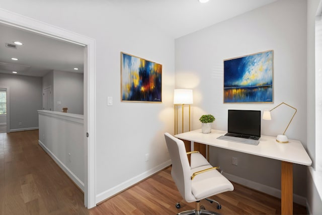 office area with recessed lighting, wood finished floors, visible vents, and baseboards