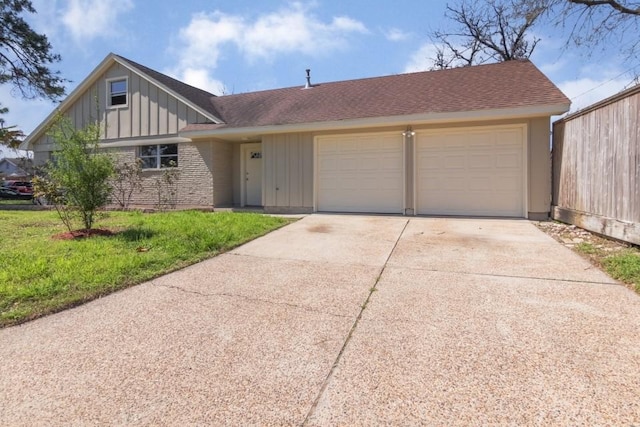 ranch-style house featuring brick siding, board and batten siding, concrete driveway, roof with shingles, and an attached garage