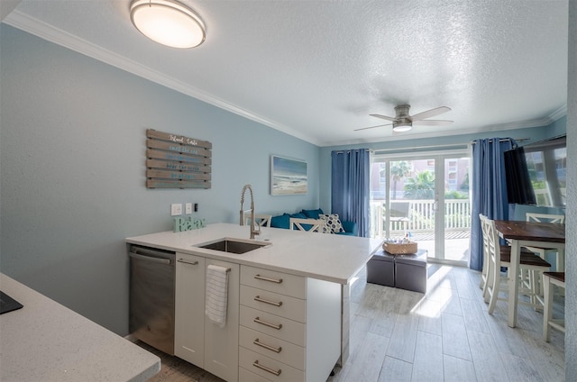 6300 Seawall Blvd Unit 9108, Galveston, TX 77551 - kitchen with light countertops, crown molding, a ceiling fan, a sink, and stainless steel dishwasher