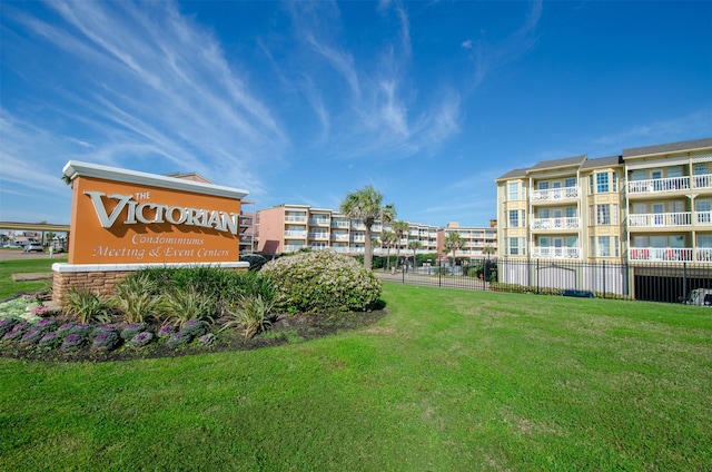 6300 Seawall Blvd Unit 9108, Galveston, TX 77551 - view of community with a lawn and fence
