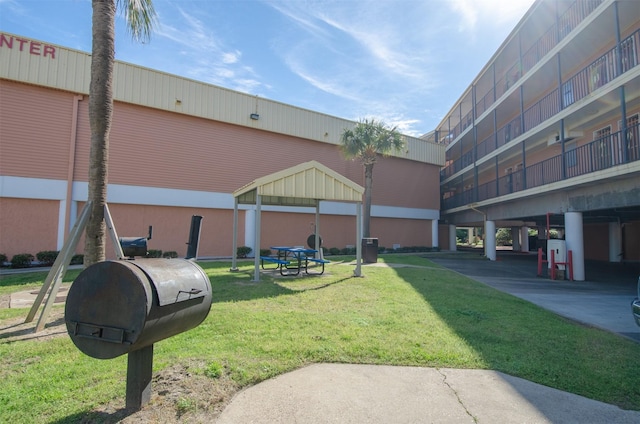 6300 Seawall Blvd Unit 9108, Galveston, TX 77551 - view of community featuring a lawn and a gazebo