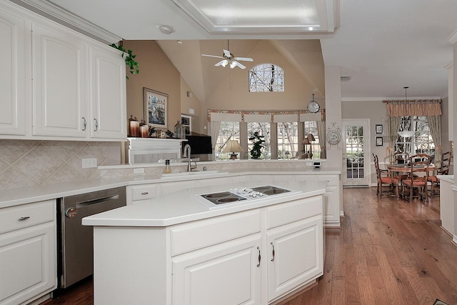 kitchen with ceiling fan, wood finished floors, a center island, dishwasher, and stovetop with downdraft