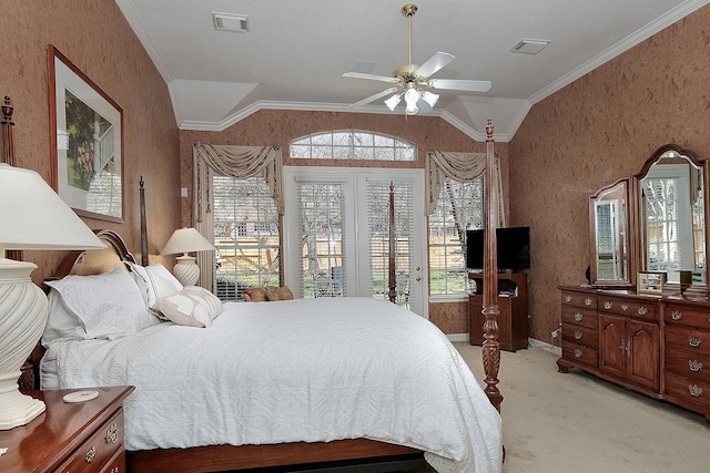 bedroom featuring ornamental molding, visible vents, vaulted ceiling, and light colored carpet