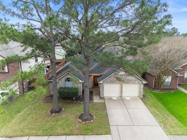 ranch-style home with a garage, concrete driveway, brick siding, and a front lawn