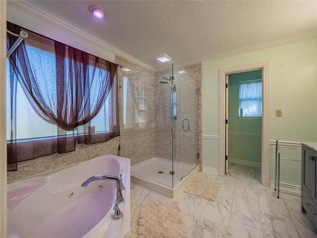 bathroom with marble finish floor, crown molding, a shower stall, and a tub with jets