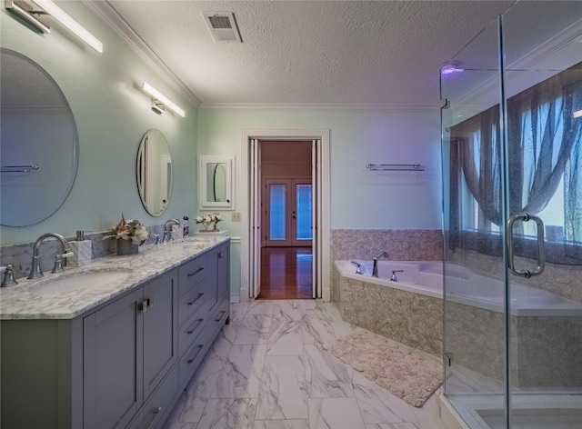 full bathroom with a sink, visible vents, marble finish floor, a stall shower, and crown molding