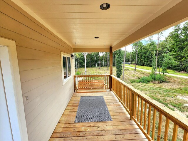 deck featuring covered porch