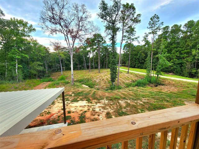 view of yard featuring a view of trees