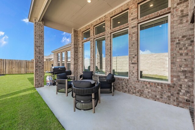 view of patio / terrace featuring fence and area for grilling