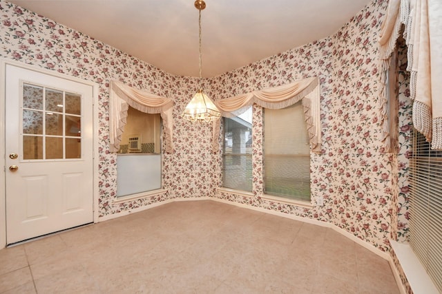 tiled empty room featuring wallpapered walls