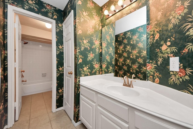 bathroom with shower / bathing tub combination, tile patterned flooring, vanity, and wallpapered walls