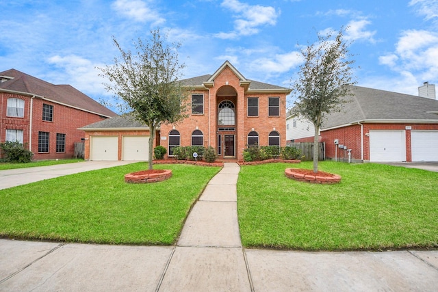 view of front of house with a garage, concrete driveway, brick siding, and a front yard