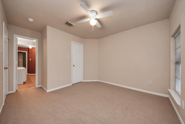 unfurnished bedroom featuring ceiling fan, carpet, visible vents, and baseboards