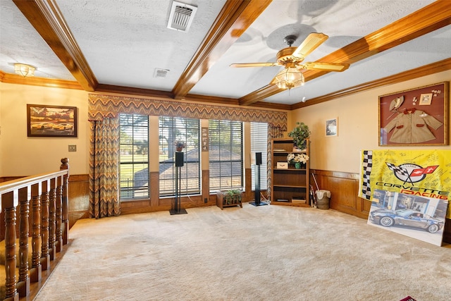 8011 Beaufort Dr, Spring, TX 77379 - interior space with beam ceiling, visible vents, a wainscoted wall, and a textured ceiling