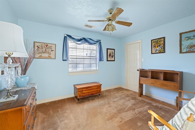 8011 Beaufort Dr, Spring, TX 77379 - sitting room with carpet, visible vents, ceiling fan, and baseboards