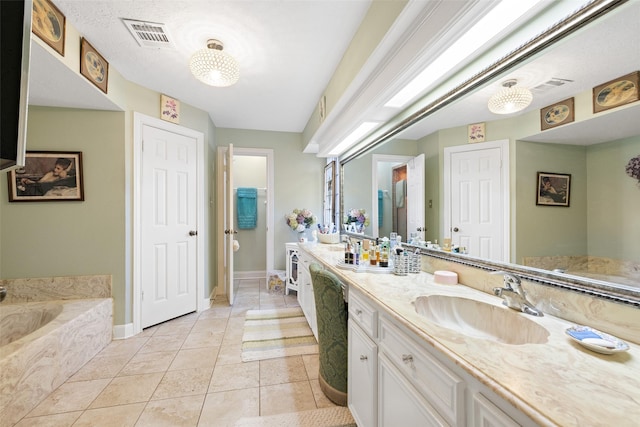 8011 Beaufort Dr, Spring, TX 77379 - full bathroom with a bath, vanity, visible vents, and tile patterned floors