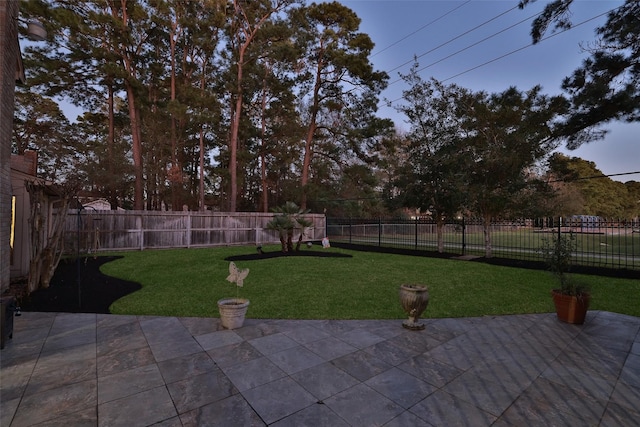 8011 Beaufort Dr, Spring, TX 77379 - view of yard with a fenced backyard and a patio