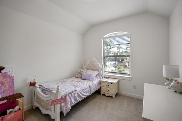 bedroom featuring vaulted ceiling, baseboards, and light colored carpet