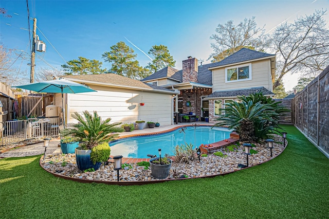 16119 Maplehurst Dr, Spring, TX 77379 - back of property featuring a chimney and a shingled roof