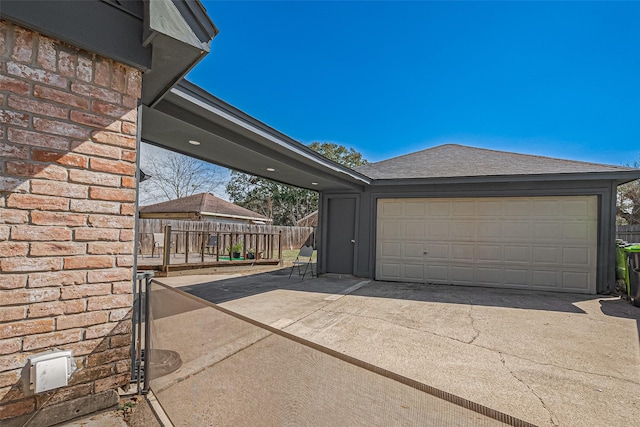 detached garage with fence