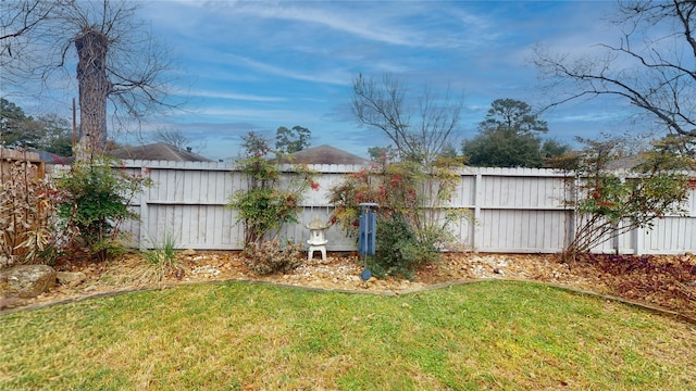 view of yard featuring a fenced backyard