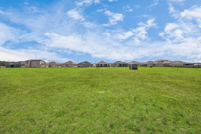 view of yard with a residential view