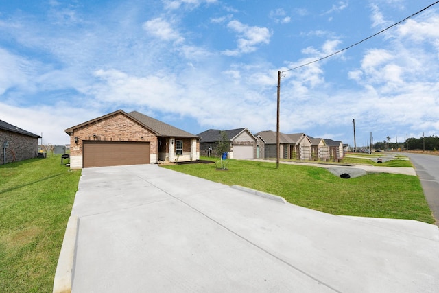 ranch-style house with a front lawn, brick siding, an attached garage, and driveway