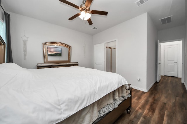 bedroom featuring visible vents, baseboards, and dark wood-style flooring