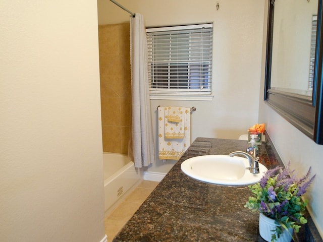 full bathroom with tile patterned flooring, shower / tub combo, and vanity