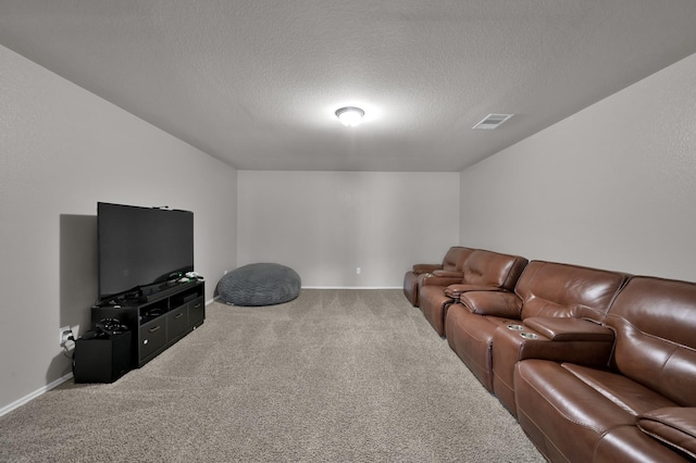 carpeted living room with visible vents and a textured ceiling