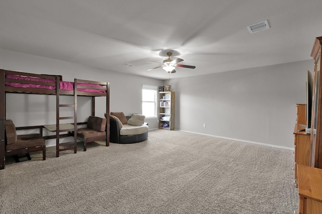 bedroom featuring visible vents, baseboards, a ceiling fan, and carpet flooring