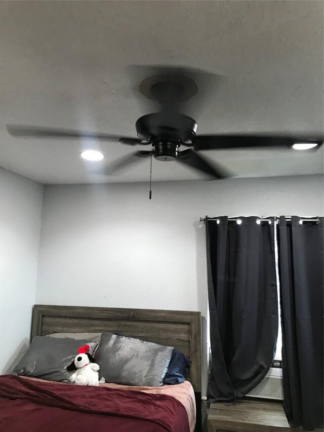 bedroom featuring a ceiling fan